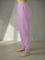 Person Bou Clothing Deryn Jogger in Sorbet colour on a neutral background